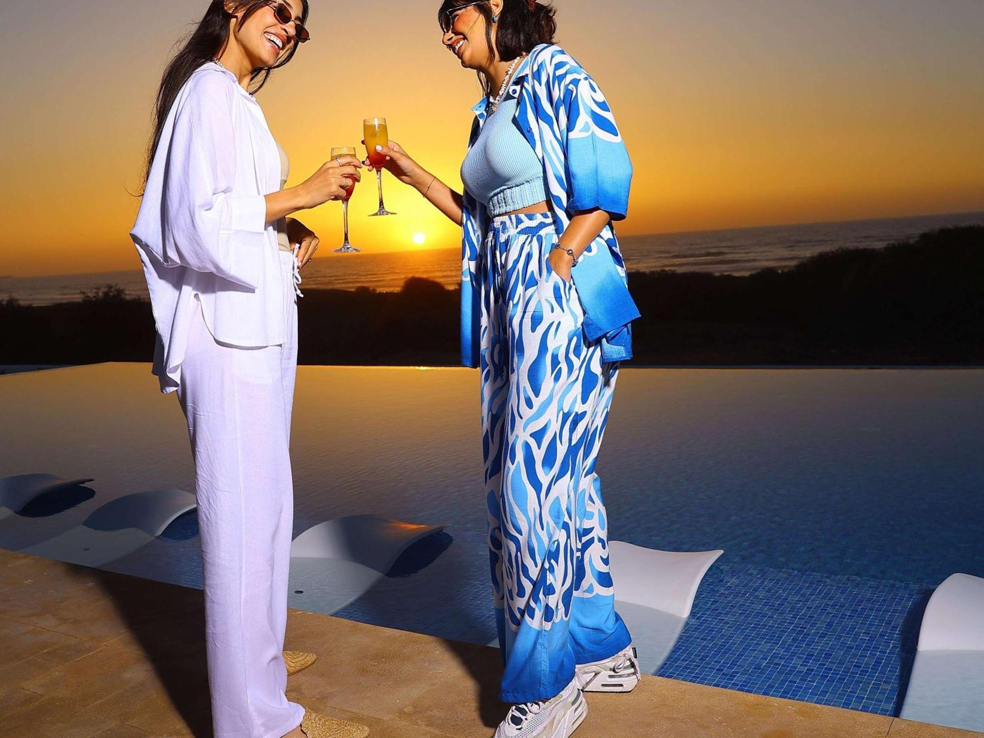Pullman Mazagan Royal Golf & Spa Ел Джадида Екстериор снимка Two women wearing kaftans